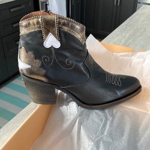 COPY - Unique stunning nemonic booties brand new with the box
For angie